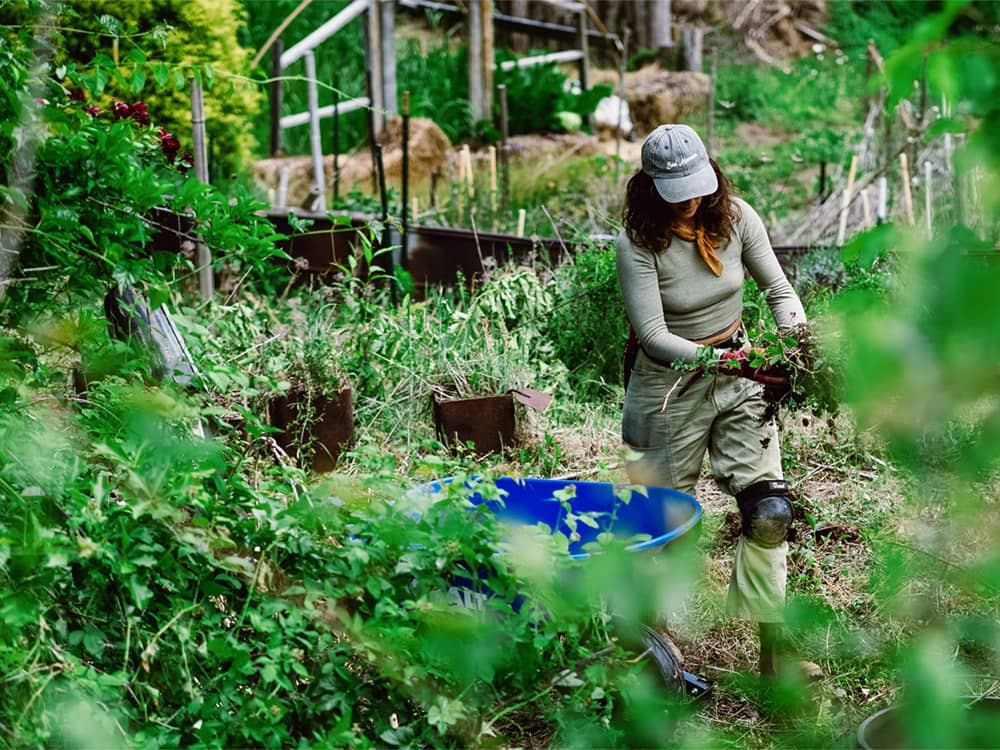 Candid shot of a crew member in a field.